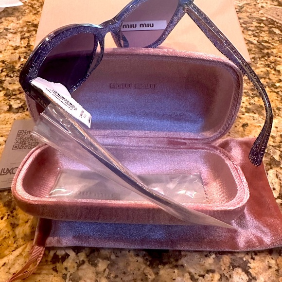 New in box with tag ๐ Miu Miu Core Collection MU 05US Glitter Blue sunglasses - Picture 3 of 4